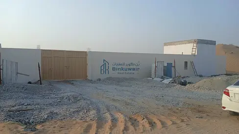 Industrial Land for Rent in Al Sajaa | 10,000 Sq. Ft. | Fenced with Office & Bathroom | Prime Location