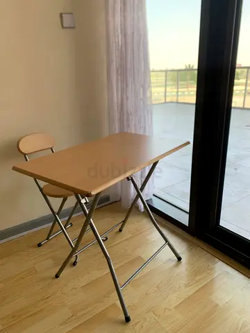 Foldable wooden table with two attached stools - compact dining/utility table