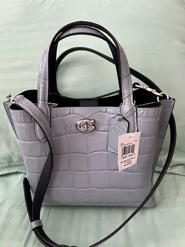 Brand new original coach hand bag with dust and cover bag