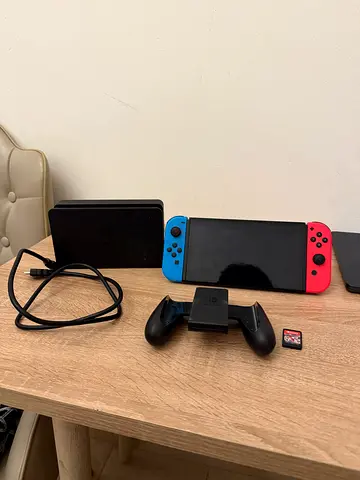 Nintendo switch 1 come with Mario cart 8 deluxe/no box/ no box for game/ no charger