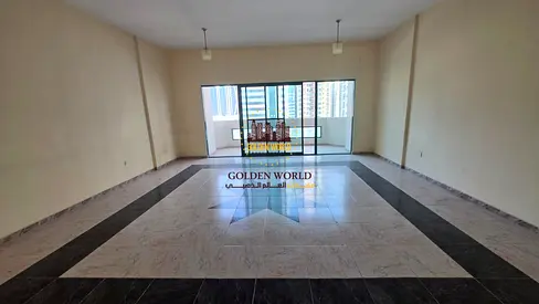 For rent in Al Majaz 2, Sharjah: Spacious 3-bedroom apartment, 2 master bedrooms, maid's room, 4 bathrooms, balcony, open view, AED 50,000 yearly.