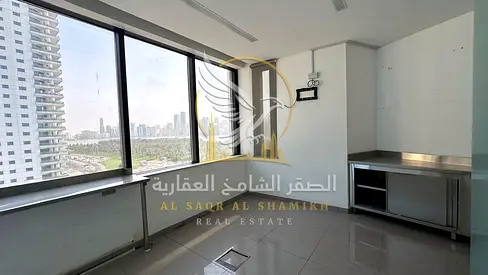 Modern Office for Rent in Al Majaz 1 Sharjah Glass Partitions Central AC and Waterfront Views