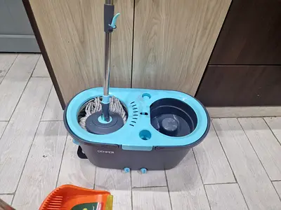 Spin mop with bucket and wringer - light blue, good condition