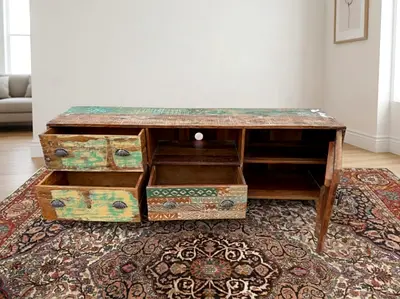 Premium Solid Wood TV Cabinet
Upgrade your living room with this premium solid wood TV cabinet. Mad