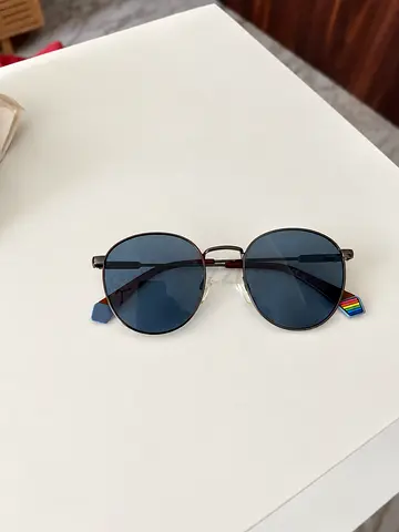 Round metal-frame sunglasses with blue lenses — gently used