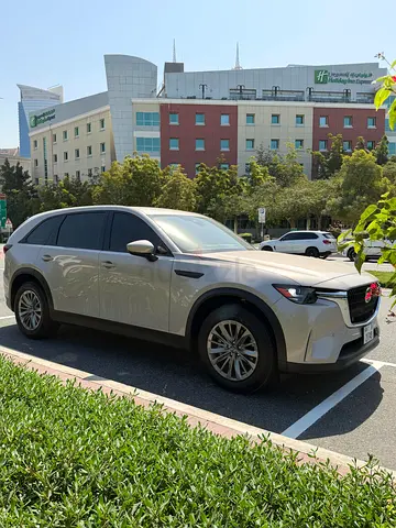Here’s a luxury-style the Mazda CX-90 Hybrid 2026