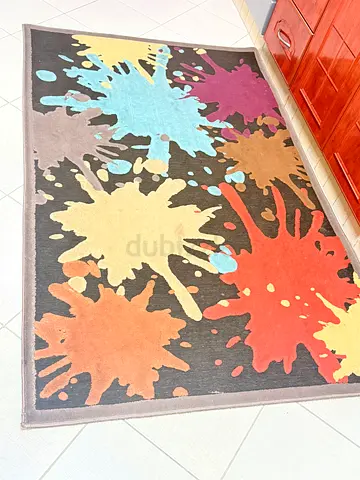 Colorful paint splash area rug — good condition, 4'x6' (approx.)