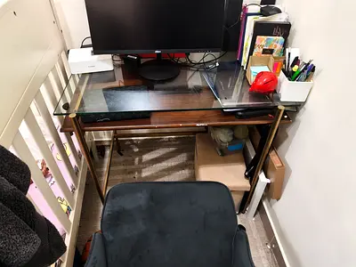 Compact glass-top study desk with chair — good condition