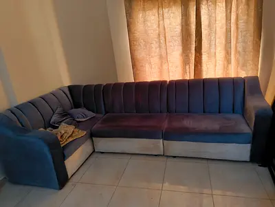 L-shaped navy blue velvet sectional sofa - good condition