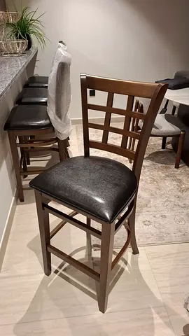 Set of 4 wooden counter stools with padded seats