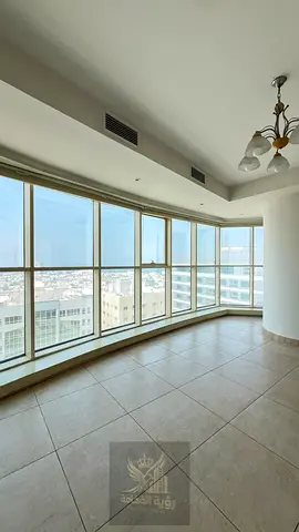 Luxury 2BR Apartment in the Heart of Sharjah | Direct Sea View + Balcony | Master Bedroom + Maid’s Room + Built-in Wardrobes | Free A/C, Maintenance &