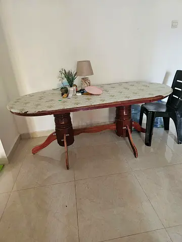 Solid wood oval dining table  - good condition