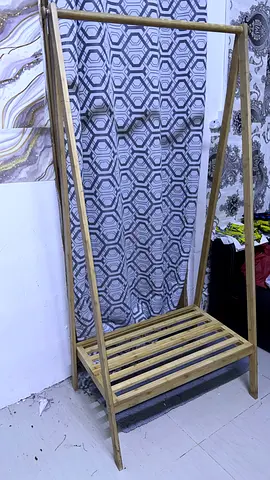 Wooden freestanding clothes rack with lower shelf - light oak finish