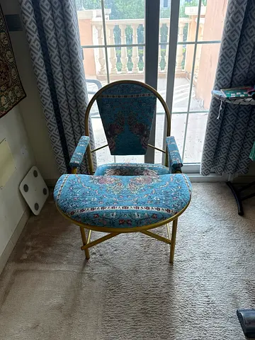 Quran reading chair with blue patterned upholstery