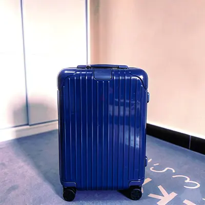Rimowa blue suitcase