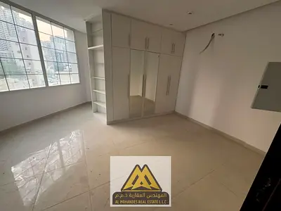 Brand-new studio in Rashidiya 3, split AC, all-inclusive, easy Sharjah and Dubai access. AED 25,005/year.