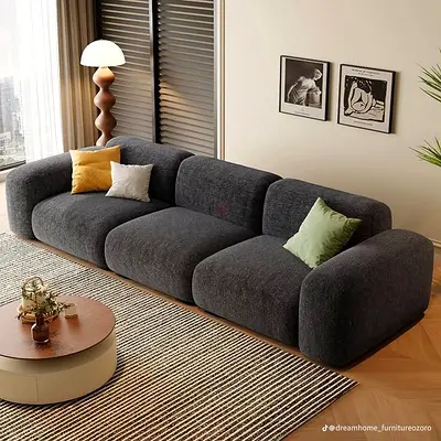 Modern low-profile 4-seater grey fabric sofa -