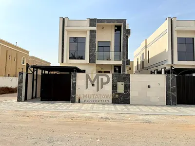 Luxury villa for sale in Al Muwaihat 3 – Ajman, situated on a street with an additional side access