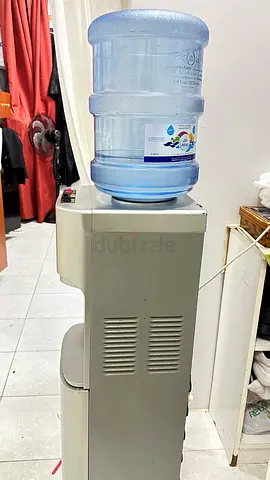 Used Office Water Dispenser Cooler - Top Load, Working good with child safety lock