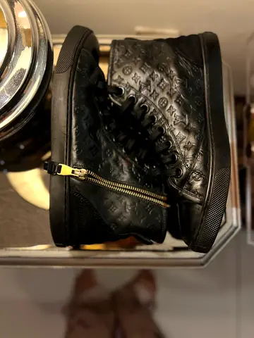 Authentic Louis Vuitton Punchy High-Top Sneaker Black Monogram Empreinte Leather .