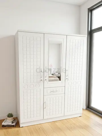 I'm selling brand new 3door cabinet available