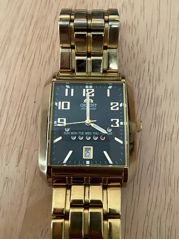 Automatic Gold-tone Orient men's rectangular watch with black dial