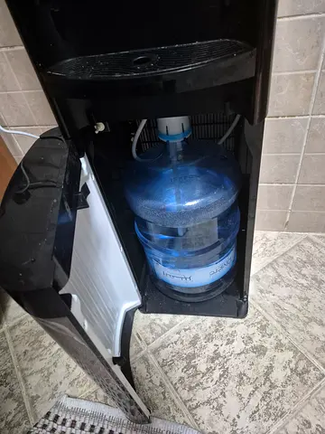 Used Water Cooler / Bottle Dispenser with 5Gallon Bottle