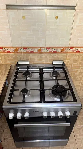 Candy 4-Burner Gas Cooker with Oven – Stainless Steel