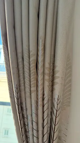 Beige patterned blackout curtains — pair, good condition. with full installation. Easy to install.