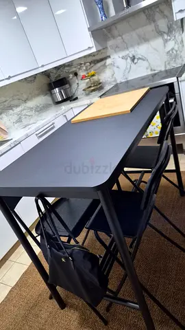 Compact black kitchen bar table with 4 stools