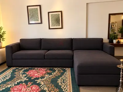 Dark grey L-shaped sectional sofa with chaise - good condition