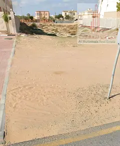 For sale in Ajman, Al Helio: a residential/investment plot for villas, 3,014 sq. G+2 with frontage o