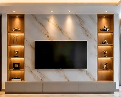 Modern built-in entertainment center with marble back panel and LED shelving