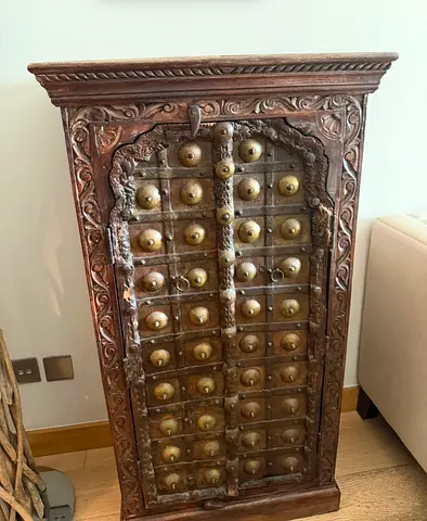 Vintage Wooden Cabinet – AED 100 Beautiful carved wooden cabinet with decorative metal detailing an