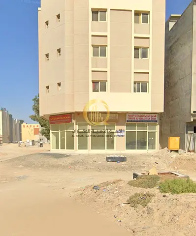 Plot of land for sale in the Muwaileh commercial area; a corner plot facing two streets. Area: 2,421 square feet.
