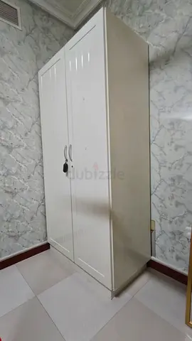 Urgent Sale - White 2-door wardrobe / cupboard - good condition