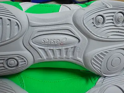 ASICS green athletic sneakers shoz