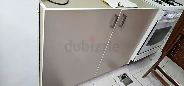 Plain two-door kitchen cabinet - good condition
