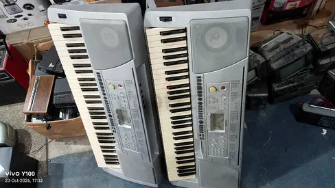 Pair of Yamaha-style 61-key electronic keyboards — used, working