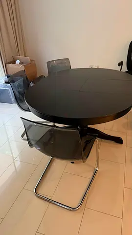 Solid black round dining table with 3 chairs (expandable)