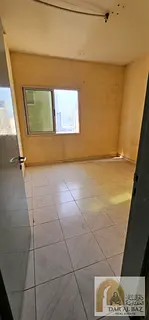 15 days free! Two-room apartment with a living area in Al Nahda, Sharjah. Features central air condi