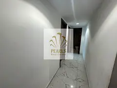 For annual rent in Oasis Towers, Al Rashidiya 1, Ajman. 2 bedrooms, separate living room, 2 bathroom