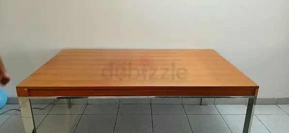 Dining table made of solid wood up for sale