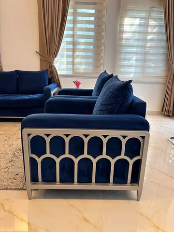 Blue velvet two-seater sofa and armchair set with silver frame