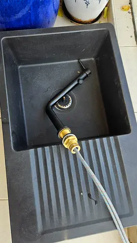 Sink with tap