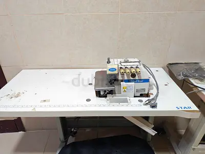 Used Industrial Overlock / Serger Sewing Machine on Table - Good Working Condition