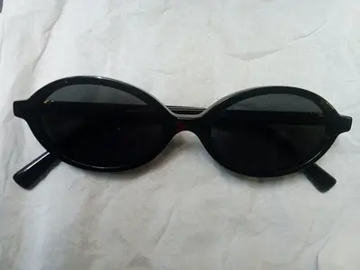 Sun Glasses by MIU MIU Itallian