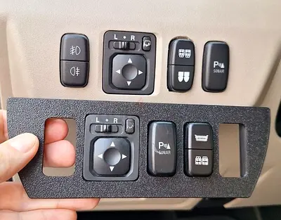 3D-printed switch panel with extra slot for Pajero