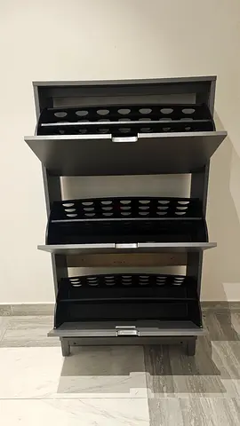 Black multi-tier shoe rack / storage shelves - sturdy wooden unit