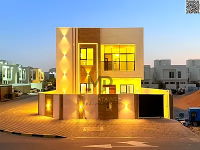 Luxury villa for sale in Al Amra, Ajman, featuring a modern design, high-end finishes, and ideal sp